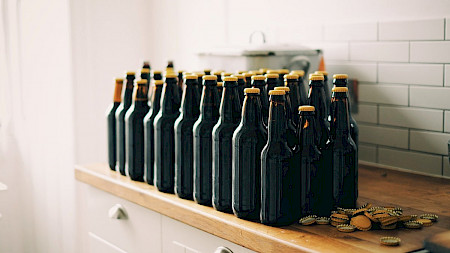 Multiple bottles of home brewed beer